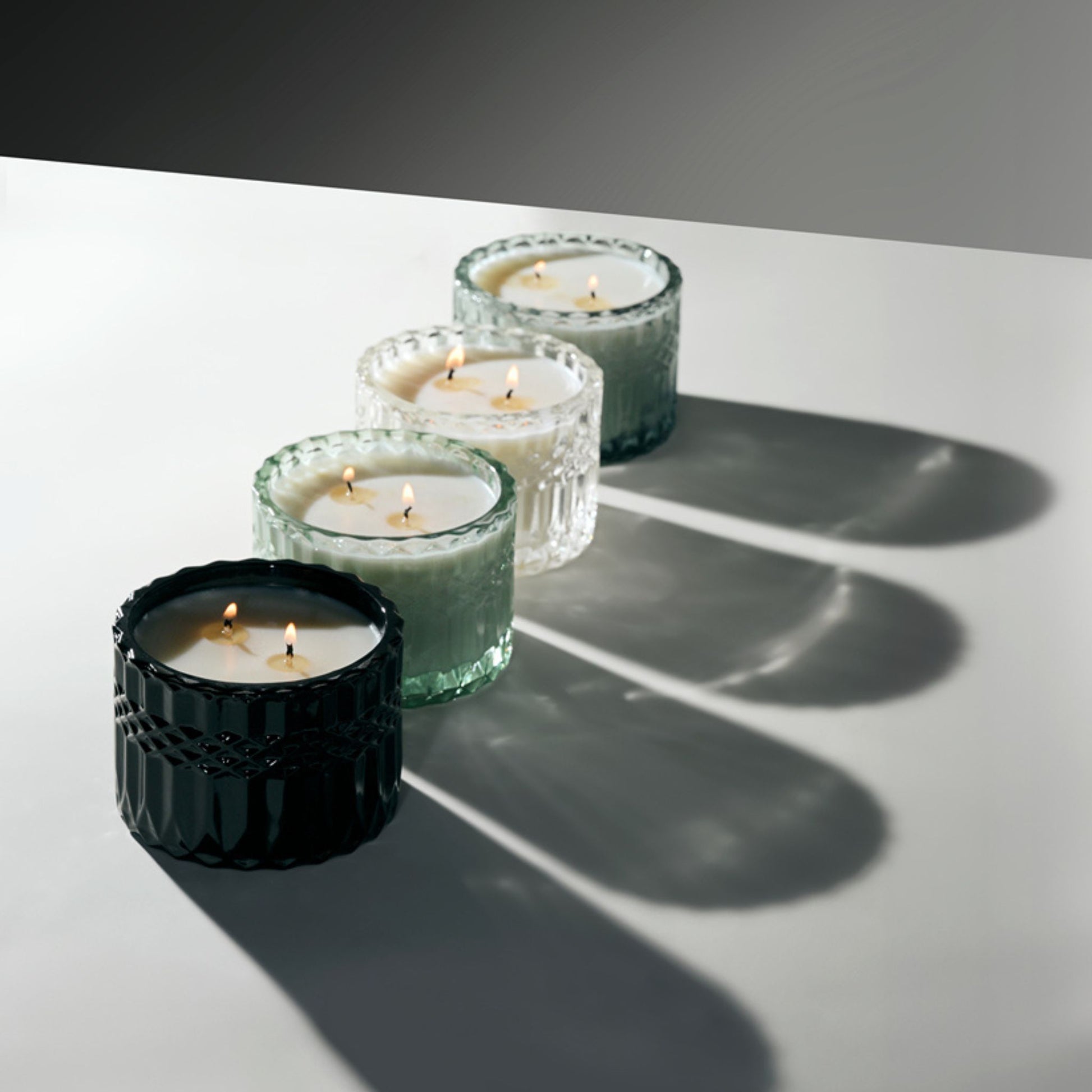 Black Candles in Glass