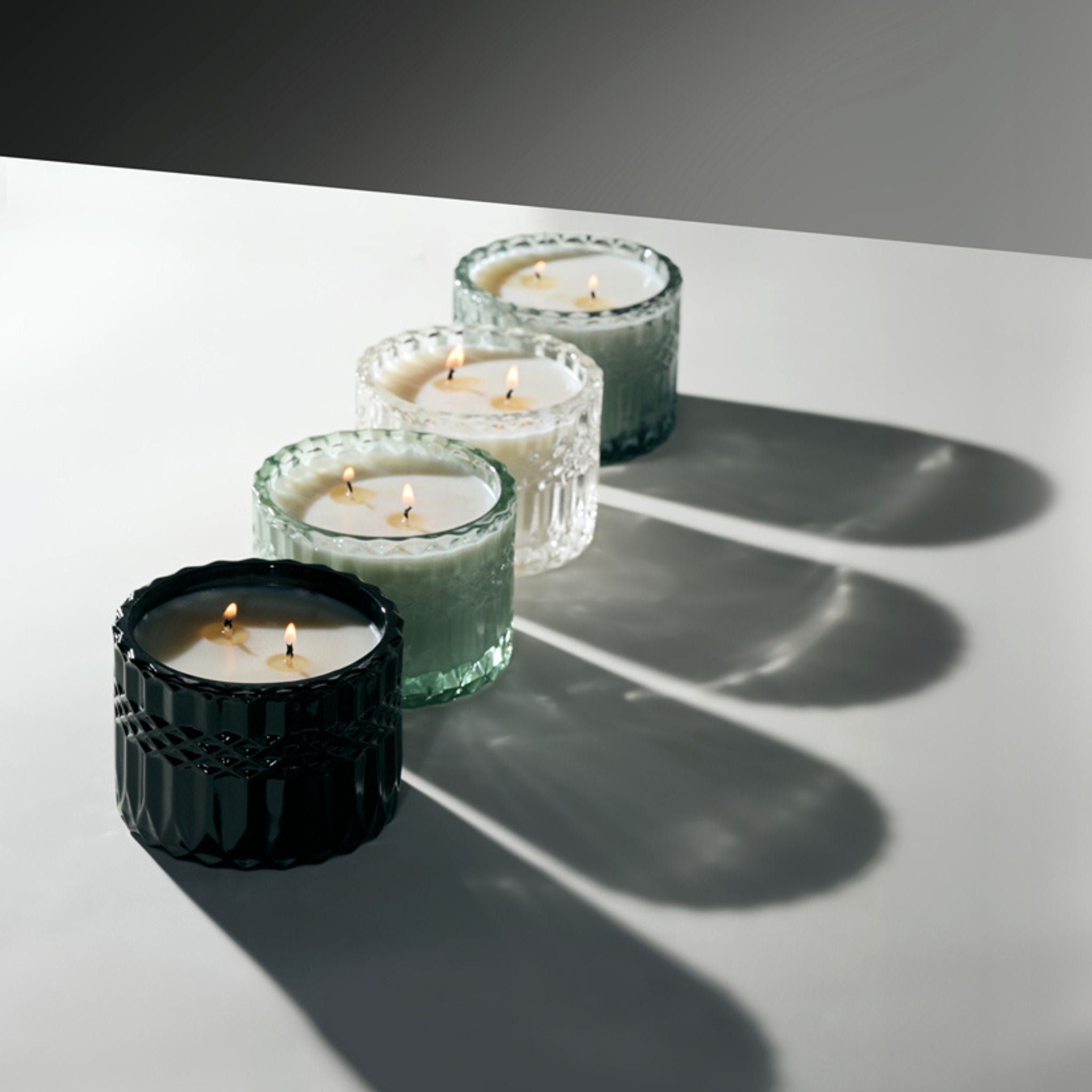 Black Candles in Glass