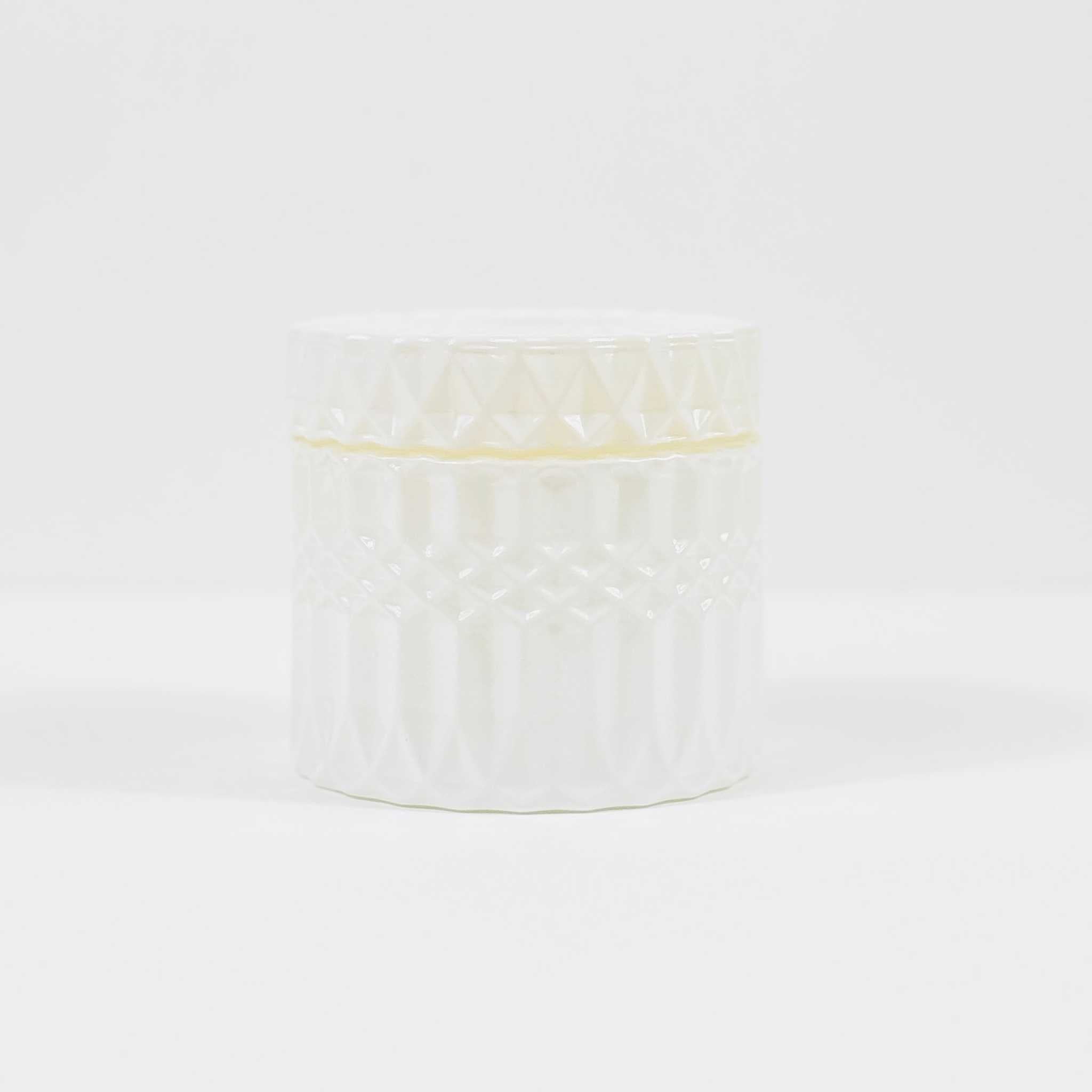 White Candles in Glass Jars